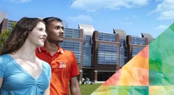 A male and female studnet looking at the UOIT buildings